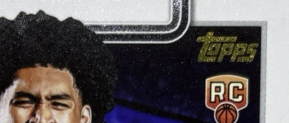 dylan-harper-golden-mirror-variation-ssp-2025-26-topps A close up of the Topps logo in gold showing a golden mirror variation card from 2025-26 Topps basketball