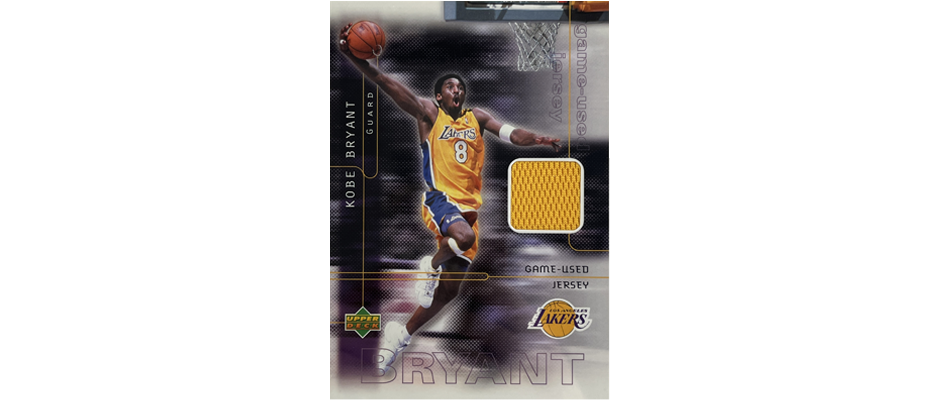 A picture of a kobe bryant basketball card with his game worn jersey inside of it