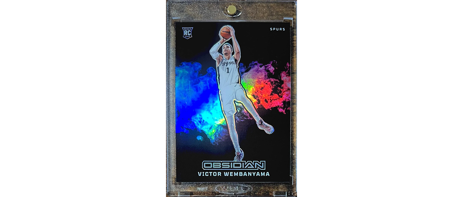 victor wembanyama color blast card in a one-touch